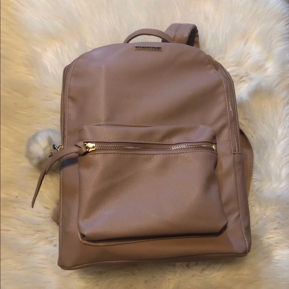 Rose gold, like new backpack
